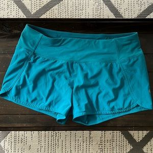 Women’s blue Lululemon speed up shorts